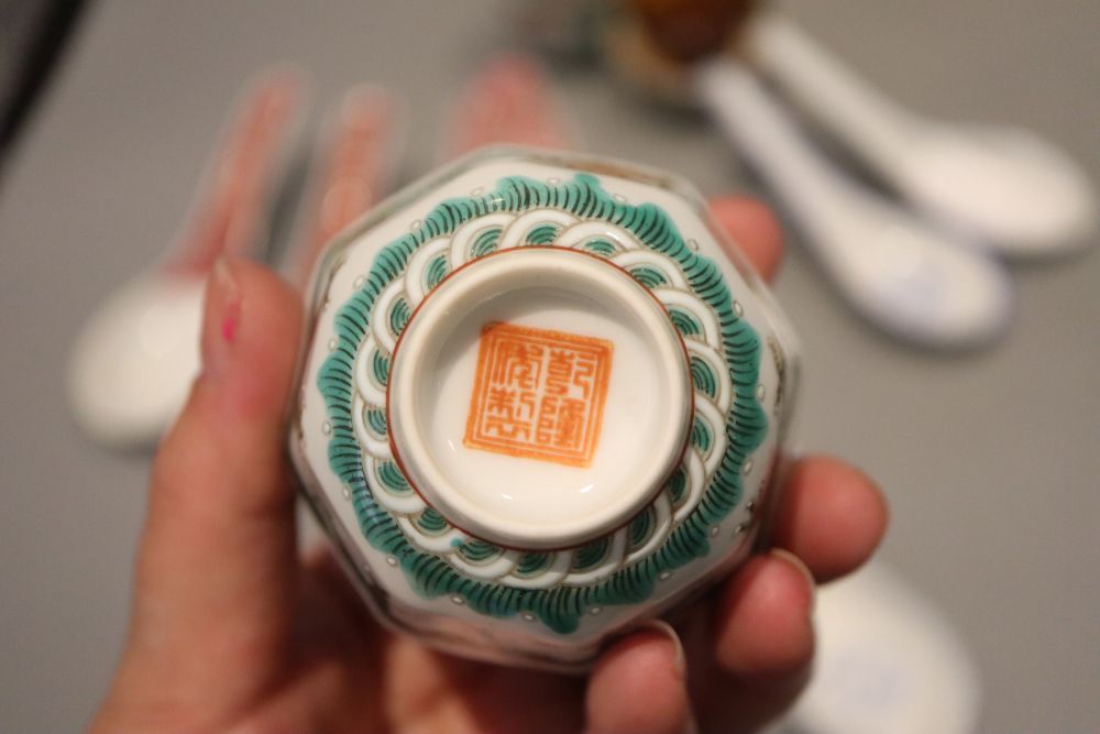 A collection of tea bowls and spoons